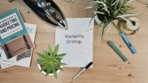 A person writing down a cannabis marketing strategy
