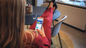 a smartphone showing numerous messaging apps